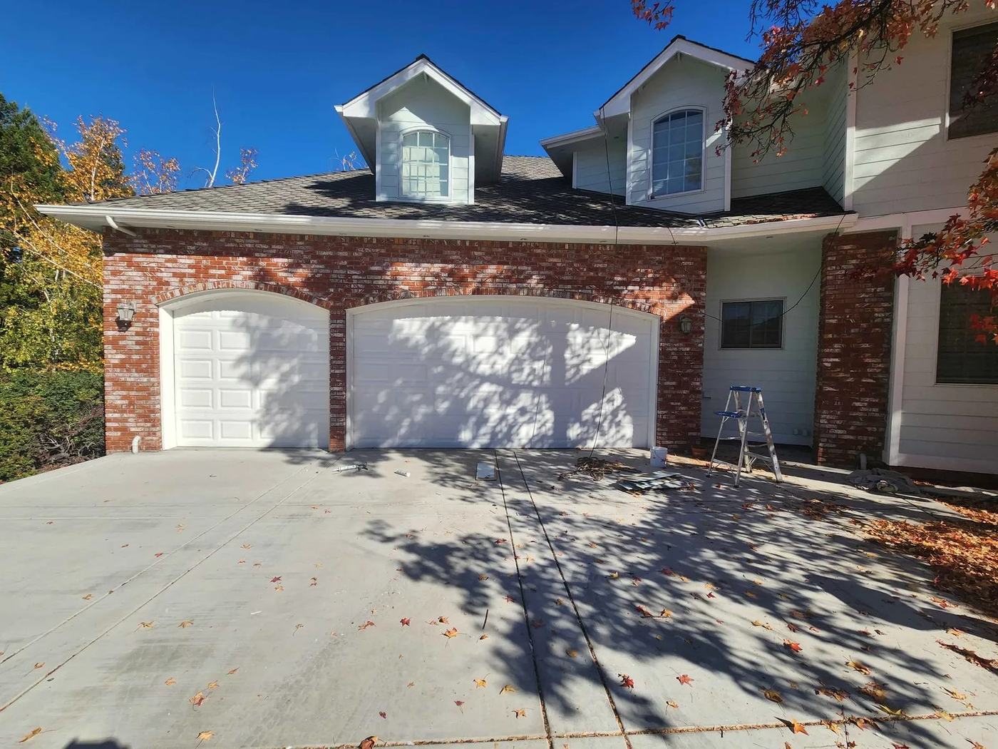 A cleared driveway and house frontage