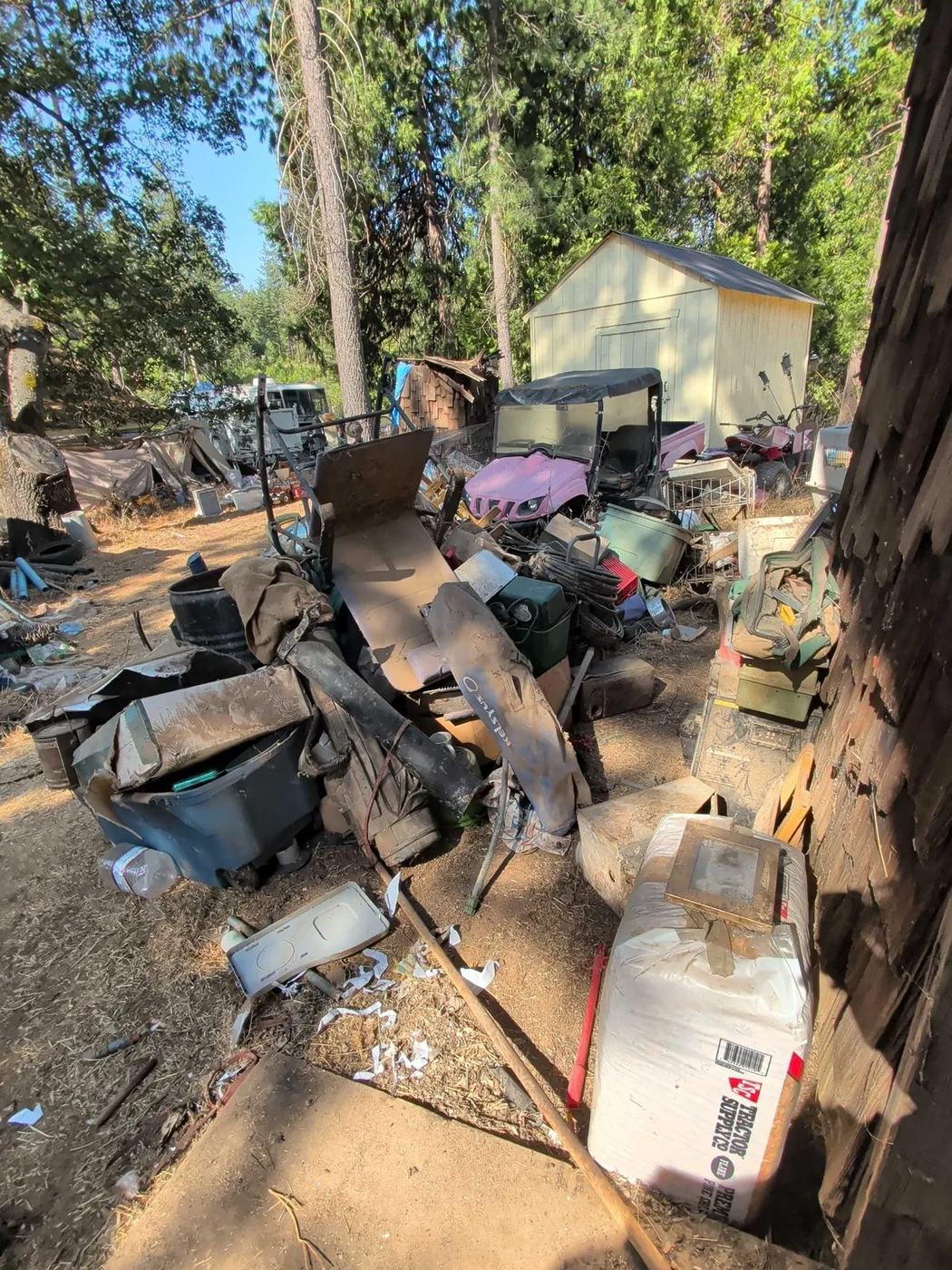 Debris gathered up ready to be loaded and hauled away